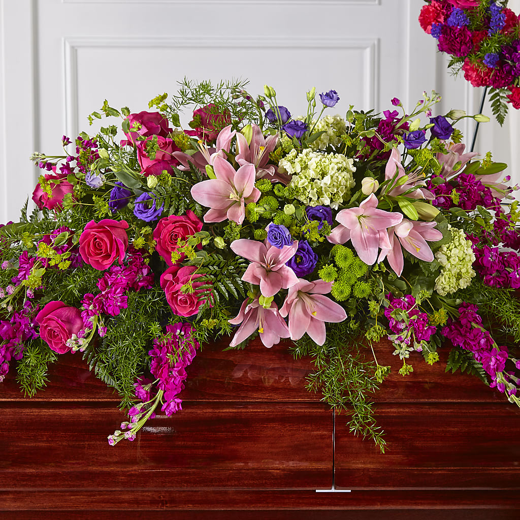 Radiant Tribute Casket Spray – Waddington Blooms, Waddington NY
