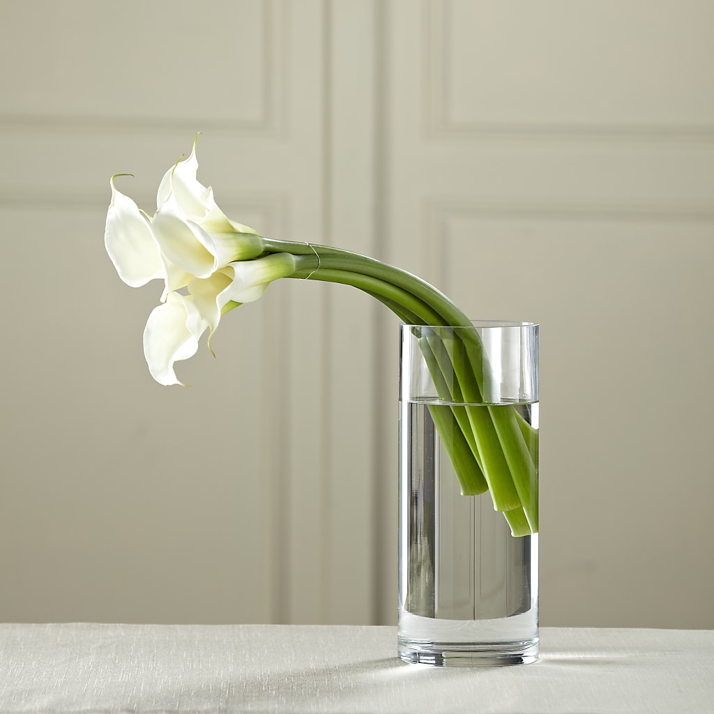 simple white lily bouquet White Calla Bouquet – white flower arrangement | Waddington, NY